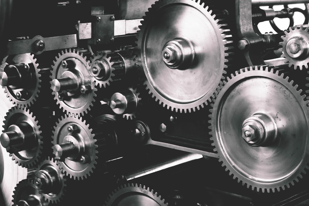 Close view of interlocking gears and cogs
